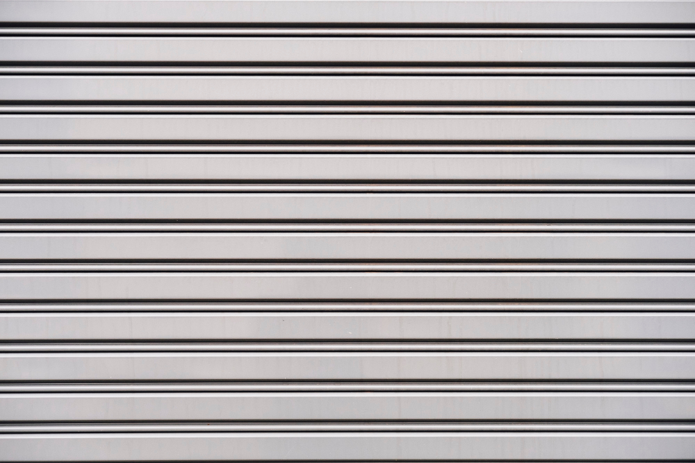 Comparison of aluminium, GI, and polycarbonate rolling shutters showing their design, strength, and applications