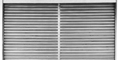 Motorized rolling shutter maintenance checklist with technician inspecting shutter and tools for smooth operation